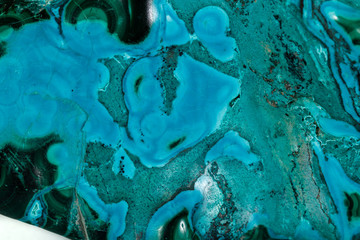 Macro mineral stone malachite Chrysocolla on a white background