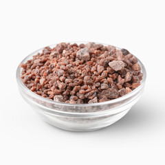 Heap of Black indian salt isolated on white