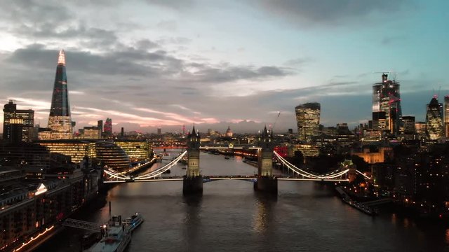 Aerial Drone Sunset Dusk View Of Tower Bridge The Shard And Thames River Panorama View London Skyline Lights