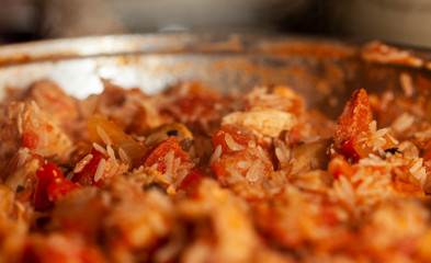 Chicken and Chorizo Jambalaya heating in a pan