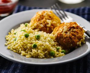 Carrot balls with bulgur and barley porridge. Vegetarian dish. Healthy food