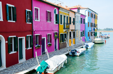 Fototapeta na wymiar The waterfront of Burano, Italy. Fairytale colorfull houses. 