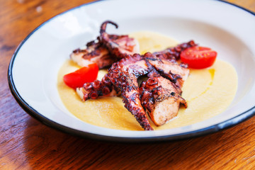 Mediterranean Octopus with vegetables and potatoes