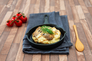 Dish made with cooked duck meat, dehydrated potato, fresh cream of mushroom and cheese