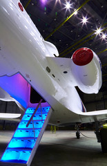 Stairs with Jet Engine on a modern private jet airplane