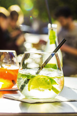 Aperol spritz and HUGO cocktail in misted glass, selective focus .