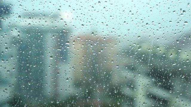 rain days, heavy rain falling on window surface
