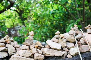 rock is arranged as a pagoda for worship of lord buddha