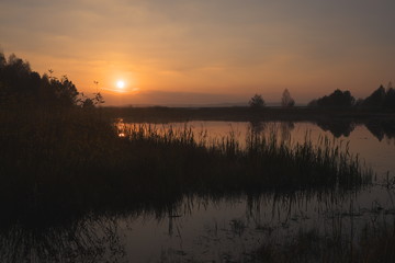 Obraz premium sunset over lake