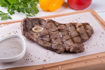 Grilled beef steak with bone