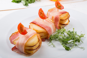 Baked bacon with potatoes snack