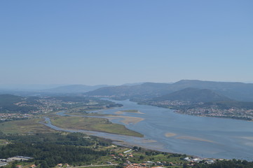 Views Of The Miño River And Portuguese Village Of Caminha From The Castro Of Santa Tecla In The Guard. Architecture, History, Travel. August 15, 2014. La Guardia, Pontevedra, Galicia, Spain.