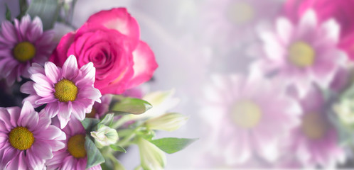 Obraz na płótnie Canvas Floral festive background template. A bouquet of flowers on a light background bokeh.