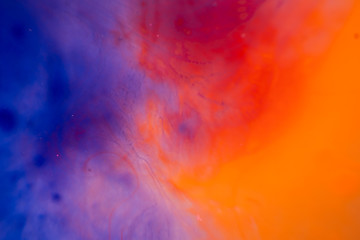 watercolor orange and blue colors in the water. abstract texture