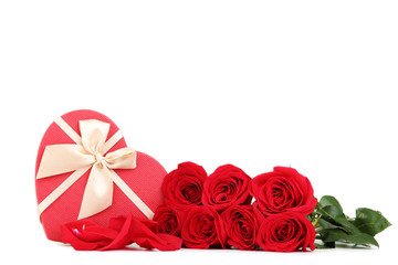 Bouquet of red roses with heart shaped gift box isolated on white background