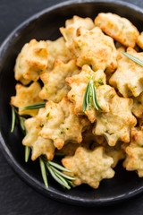 Delicious homemade cookies with parmesan cheese and rosemary