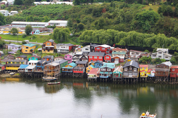 Stilt houses of the small town of Castro in Chiloe island in Chile. Castro is famous for its palafitos, traditional wooden stilt houses which were common in many places in Chiloé island.