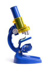 Blue children's microscope isolated on white background