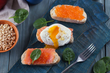 Sandwiches with red fish and caviar