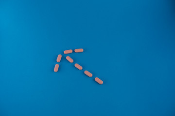 pills in blue background