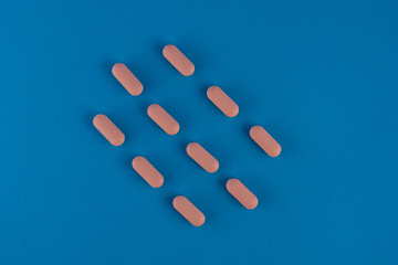 pills in blue background