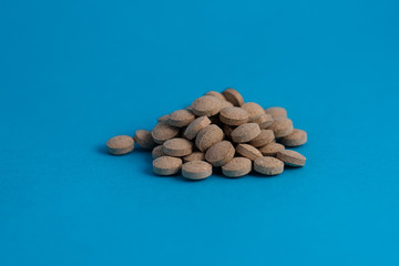 pills in blue background