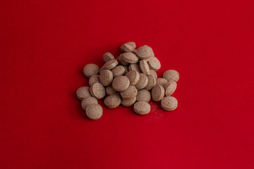 Pills with red background