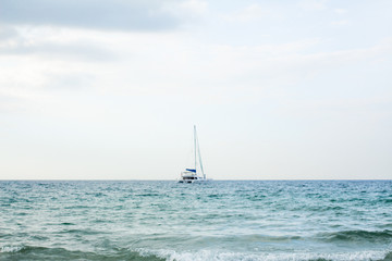 Fototapeta premium Sailboat in the middle of the sea Phuket Thailand
