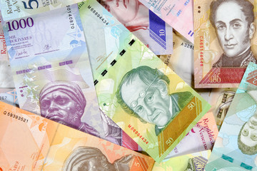 Venezuela hyperinflation bolivar banknotes, different bills of fuerte series. Venezuelan bolivar fuerte. beautiful colorful obverse side bolivares close up background.