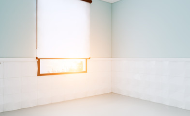 Empty bathroom interior with blue walls and white tiles. 3D rendering. Mockup. Sunset