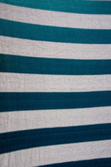 Fototapeta premium Texture of a plastic striped green and white sun protection mesh