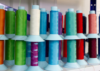 Shelf with multi-colored skeins of thread