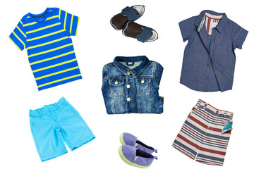 Collage set of children clothes. A Denim jeans jacket, denim shoes, shirts and two short pants for child boy isolated on a white background. Concept spring and summer clothes. Close-up.