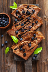 Close up of Traditional homemade chocolate pancakes. Celebration of Maslenitsa, Shrovetide.