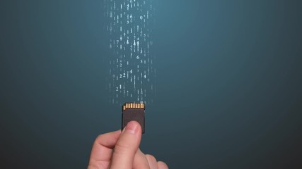 Flash SD card in male hand with animation of numbers