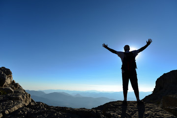 peak happiness concept for climber