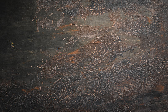 Old wooden and stone brown background. Top view. Free copy space.