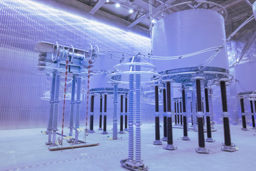 Inside high voltage direct current HVDC station. Electrical equipment in the closed substation...