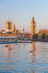Fototapeta premium Big Ben and Houses of Parliament with boat in London, England, UK