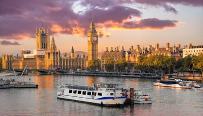 Fotobehang Big Ben and Houses of Parliament with boat in London, England, UK © Tomas Marek