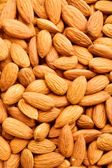 Organic almonds top view as background,. Healthy dry fruits