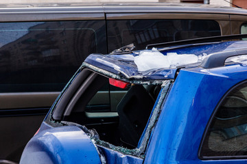Snow from the roofs fell on the car and broke the rear window