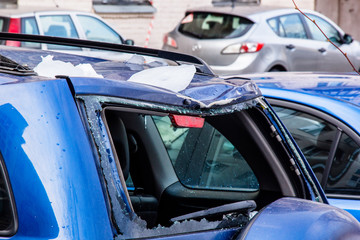 Snow from the roofs fell on the car and broke the rear window