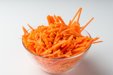 Sliced carrots Carrots background. Carrot sliced into pieces. Carrot straws.