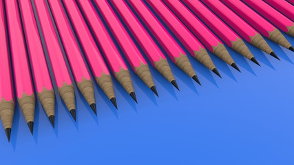 Row of pencils on blue