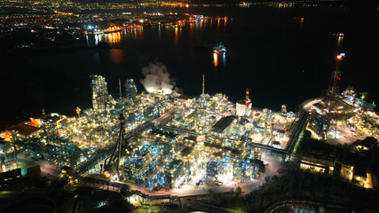 Aerial drone night shot of petrochemical industrial complex with oil refinery in area of Elefsina, Attica, Greece