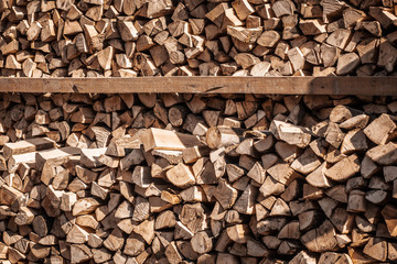  Background a lot of chopped firewood.  Firewood texture