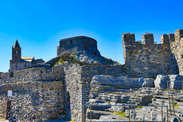 Doria Castle and church of St. Peter, San Pietro sit above the Ligurian village of Porto Venere (Portovenere) Italy.  This is a UNESCO World Heritage site.