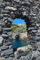 Doria Castle and church of St. Peter, San Pietro sit above the Ligurian village of Porto Venere (Portovenere) Italy.  This is a UNESCO World Heritage site.