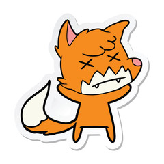 sticker of a cartoon cross eyed fox